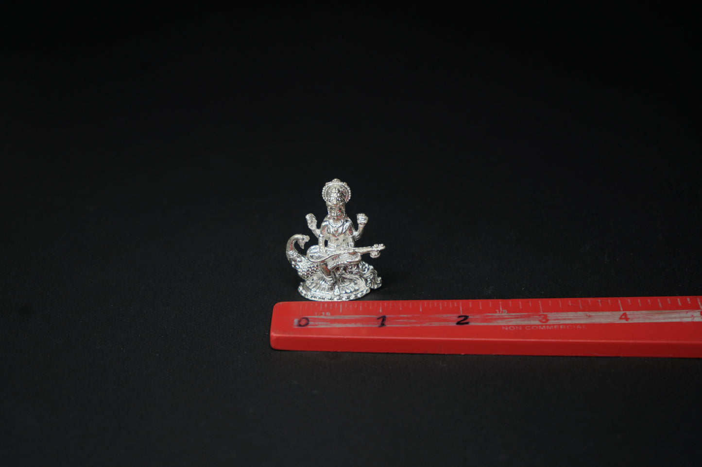 Pure Silver Saraswati on Peacock Idol