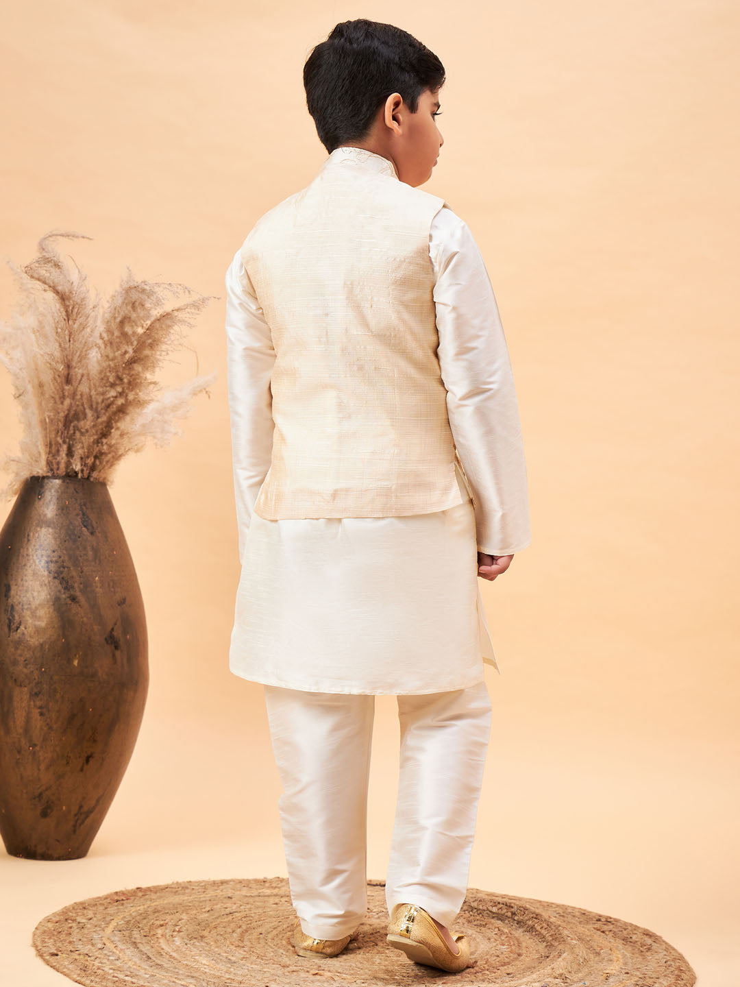 Vastramay Boy's Beige Nehru Jacket With Cream Kurta And Pyjama Set