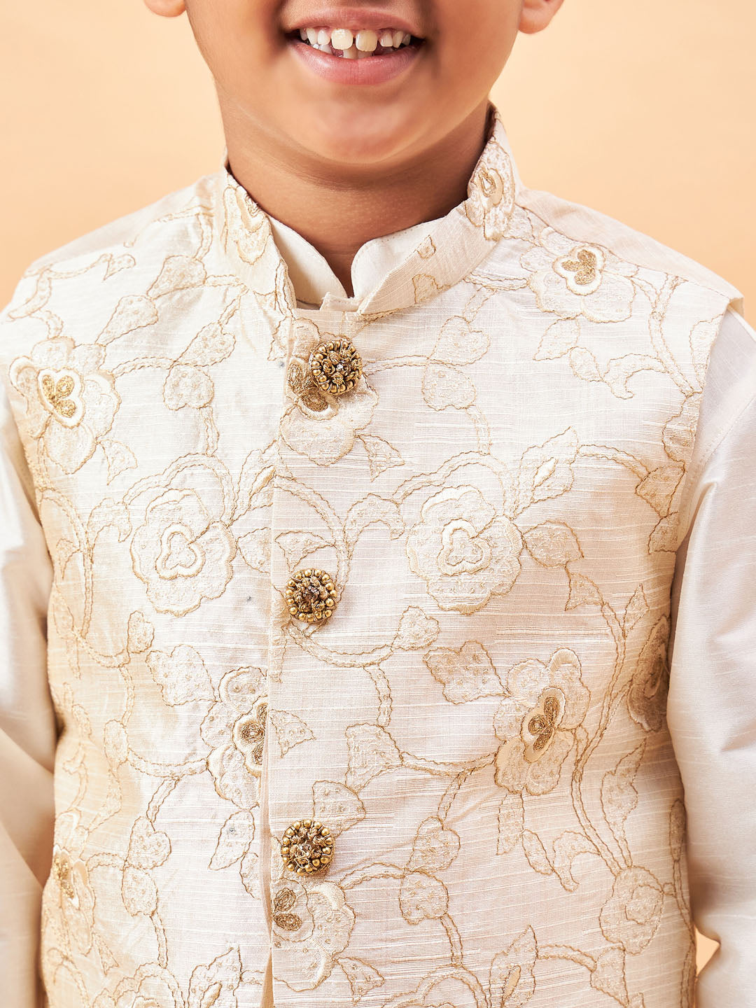 Vastramay Boy's Beige Nehru Jacket With Cream Kurta And Pyjama Set