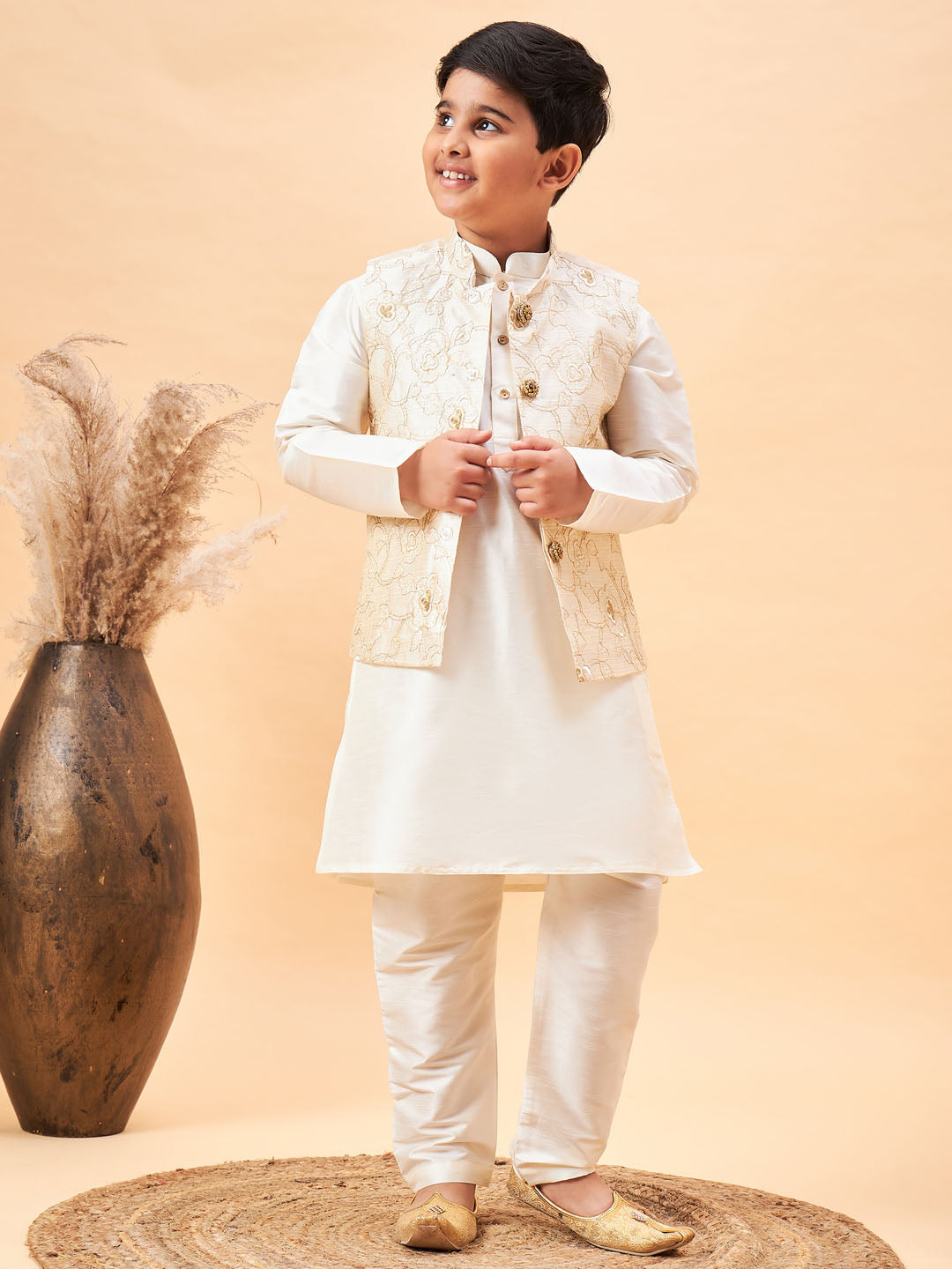 Vastramay Boy's Beige Nehru Jacket With Cream Kurta And Pyjama Set