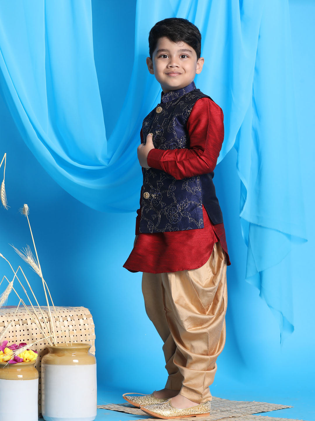 Vastramay boys navy blue embroidered nehru jacket with maroon kurta and rose gold dhoti set