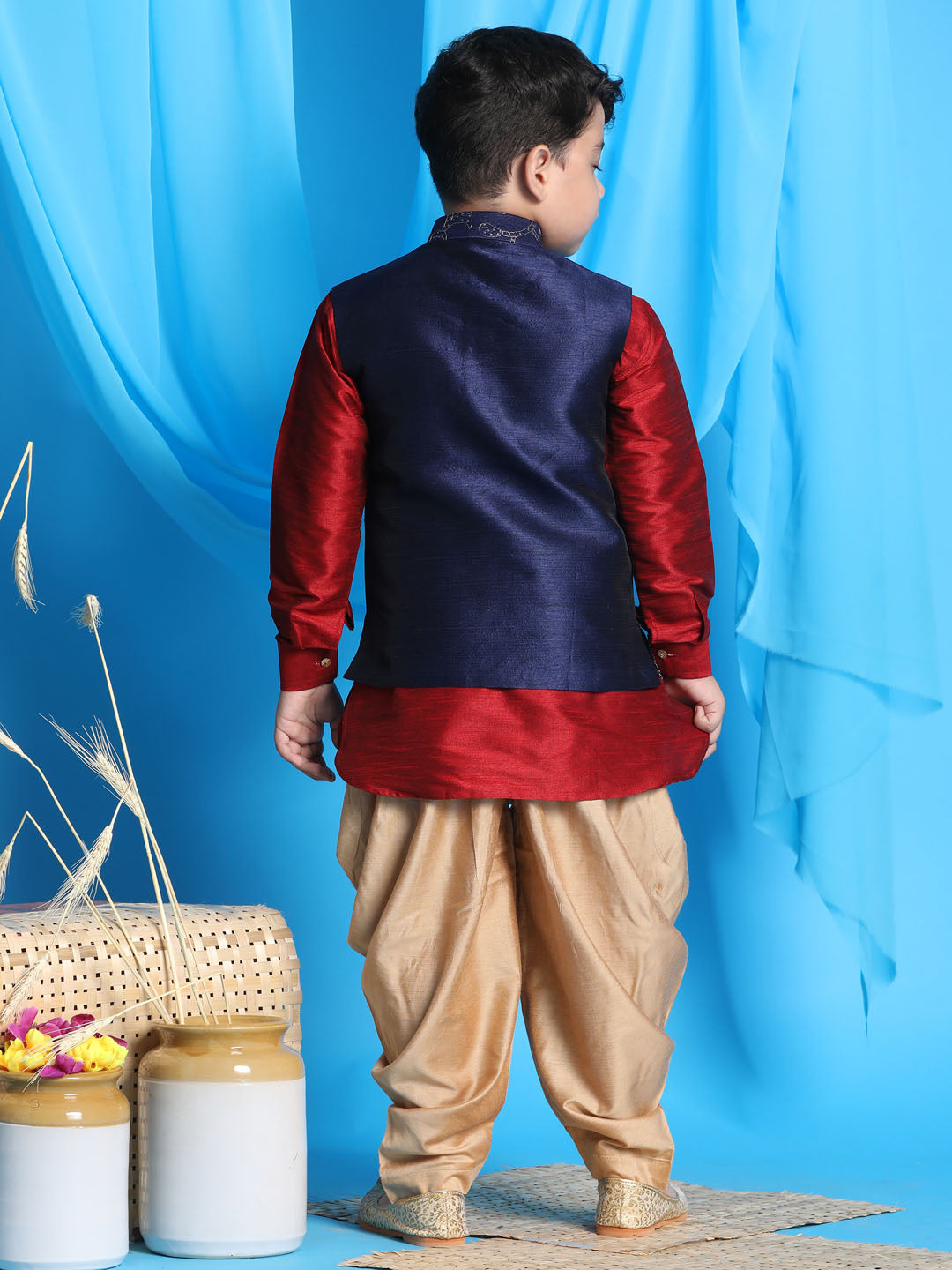 Vastramay boys navy blue embroidered nehru jacket with maroon kurta and rose gold dhoti set