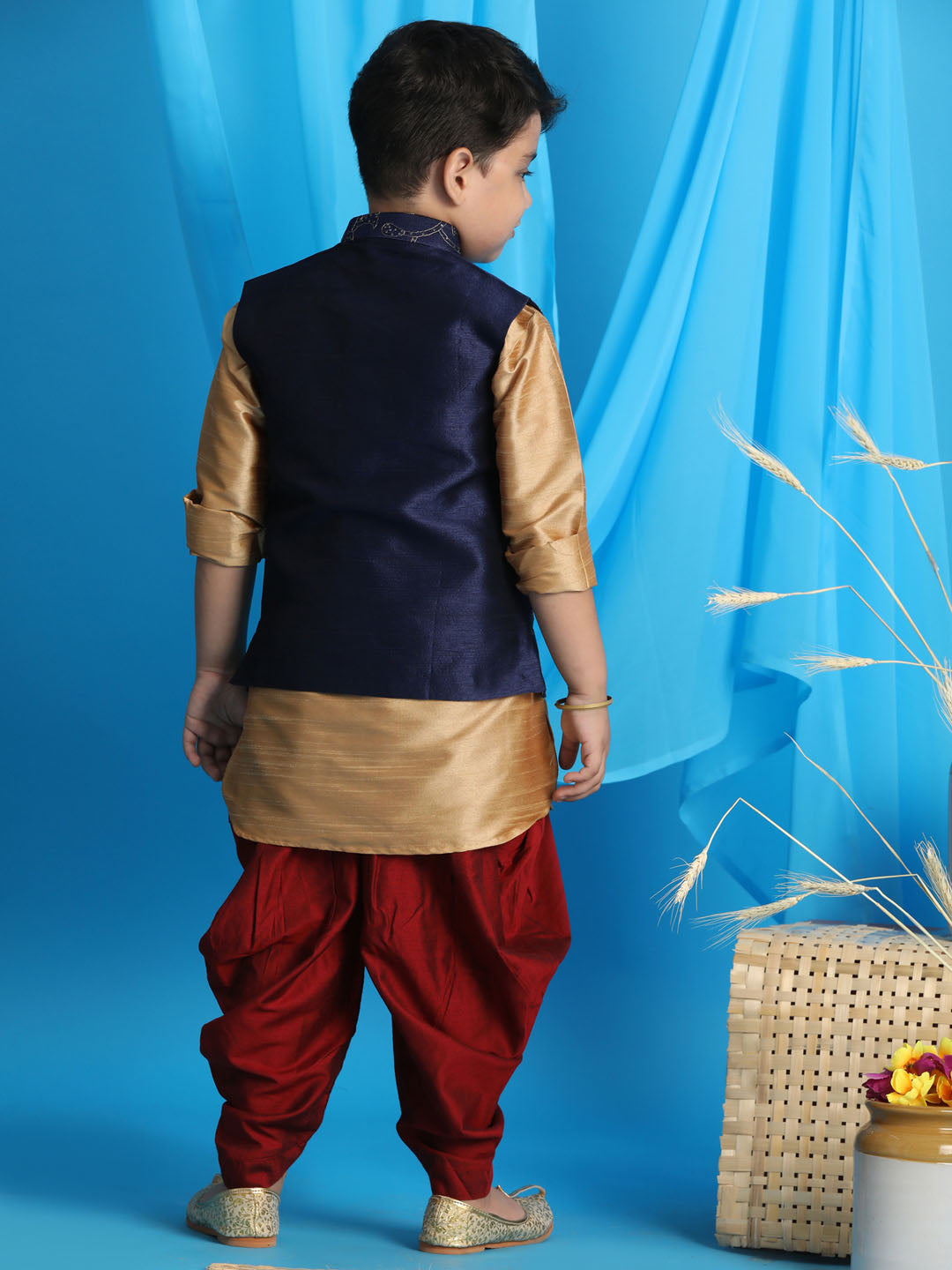 Vastramay boys navy blue embroidered nehru jacket with rose gold kurta and maroon dhoti set