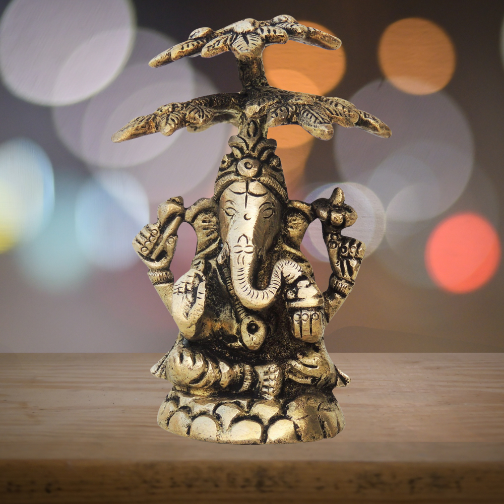 Brass Ganesh On Tree Statue