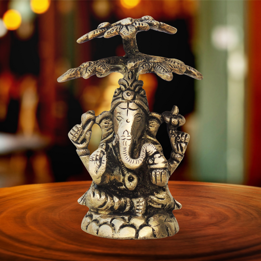 Brass Ganesh On Tree Statue