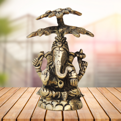 Brass Ganesh On Tree Statue