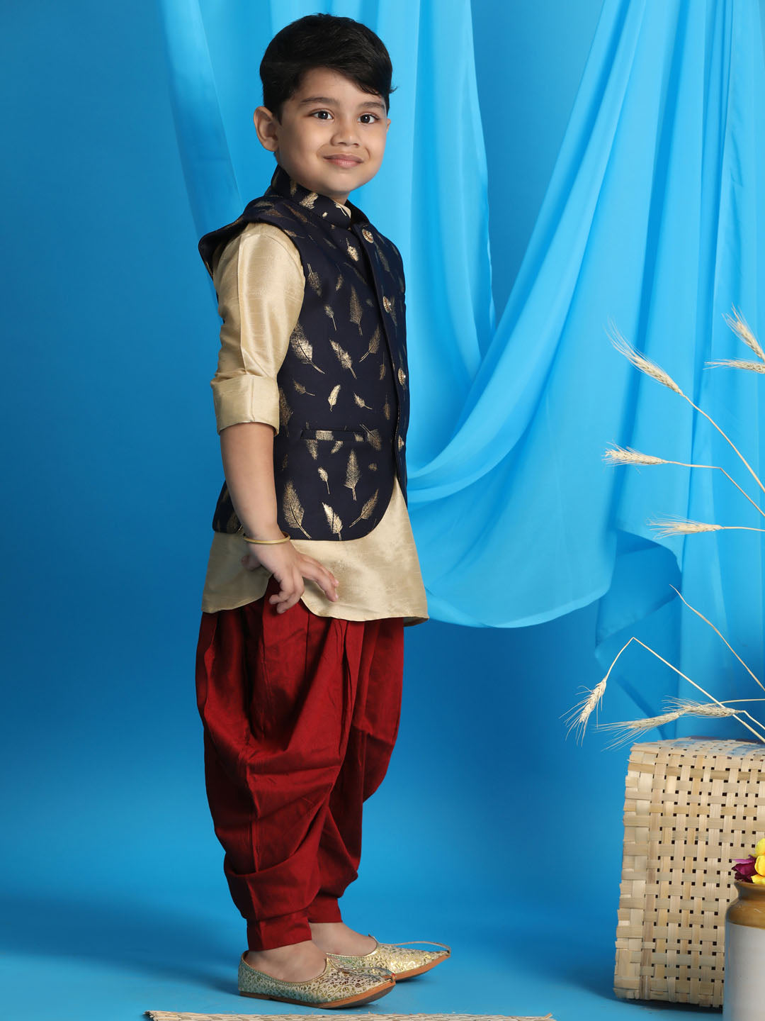 Vastramay boys navy blue golden printed nehru jacket with gold kurta and maroon dhoti set