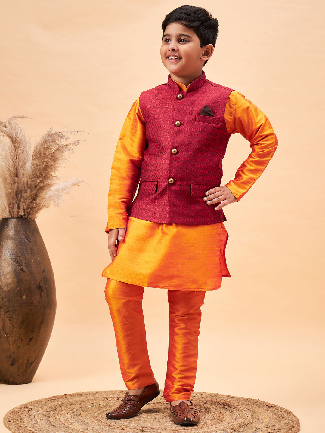 VASTRAMAY Boy's Maroon Woven Nehru Jacket With Orange Kurta And Pyjama Set