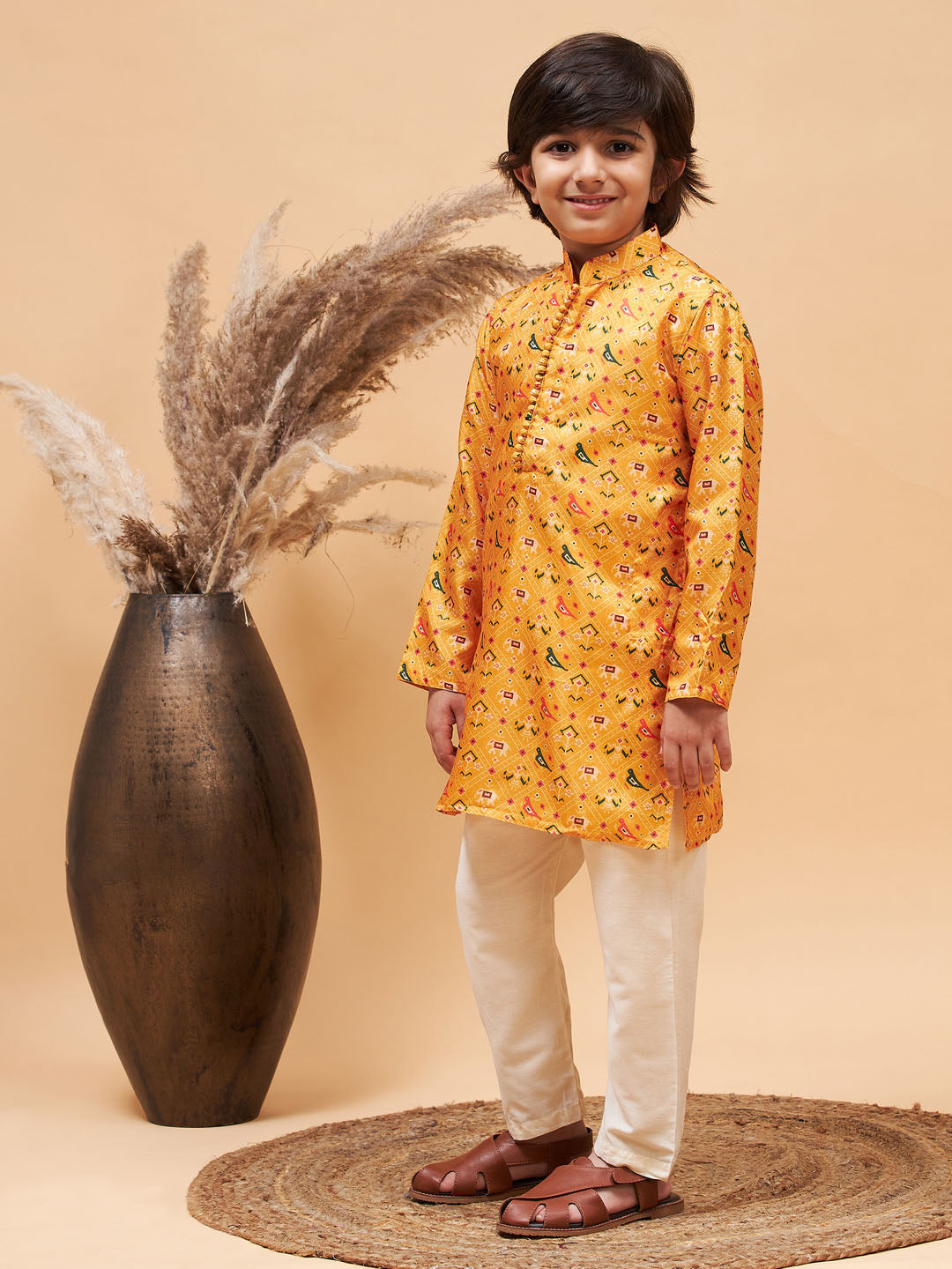 Vastramay boys yellow patola printed kurta and cream pyjama set