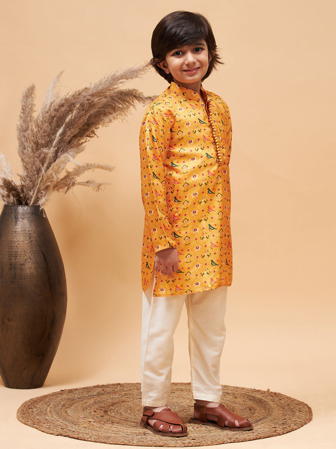 Vastramay boys yellow patola printed kurta and cream pyjama set