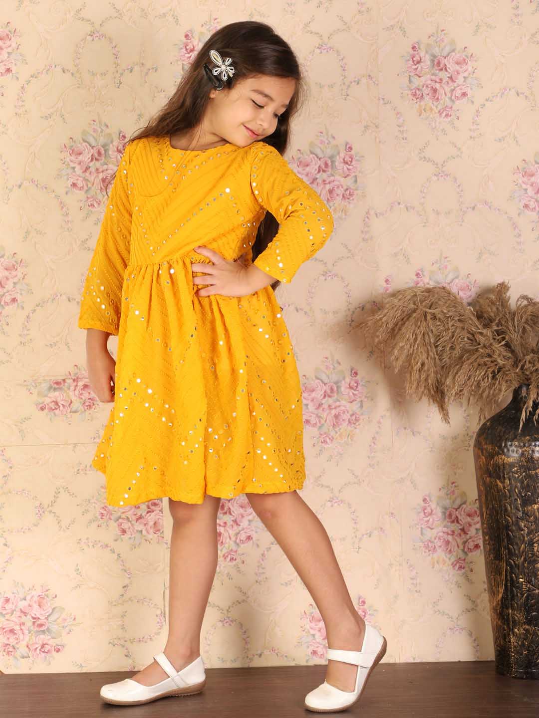 shrestha by Vastramay girls yellow color mirror work round kurta