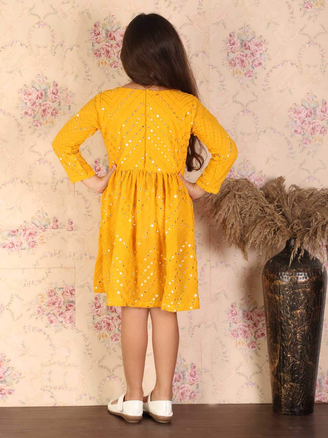 shrestha by Vastramay girls yellow color mirror work round kurta