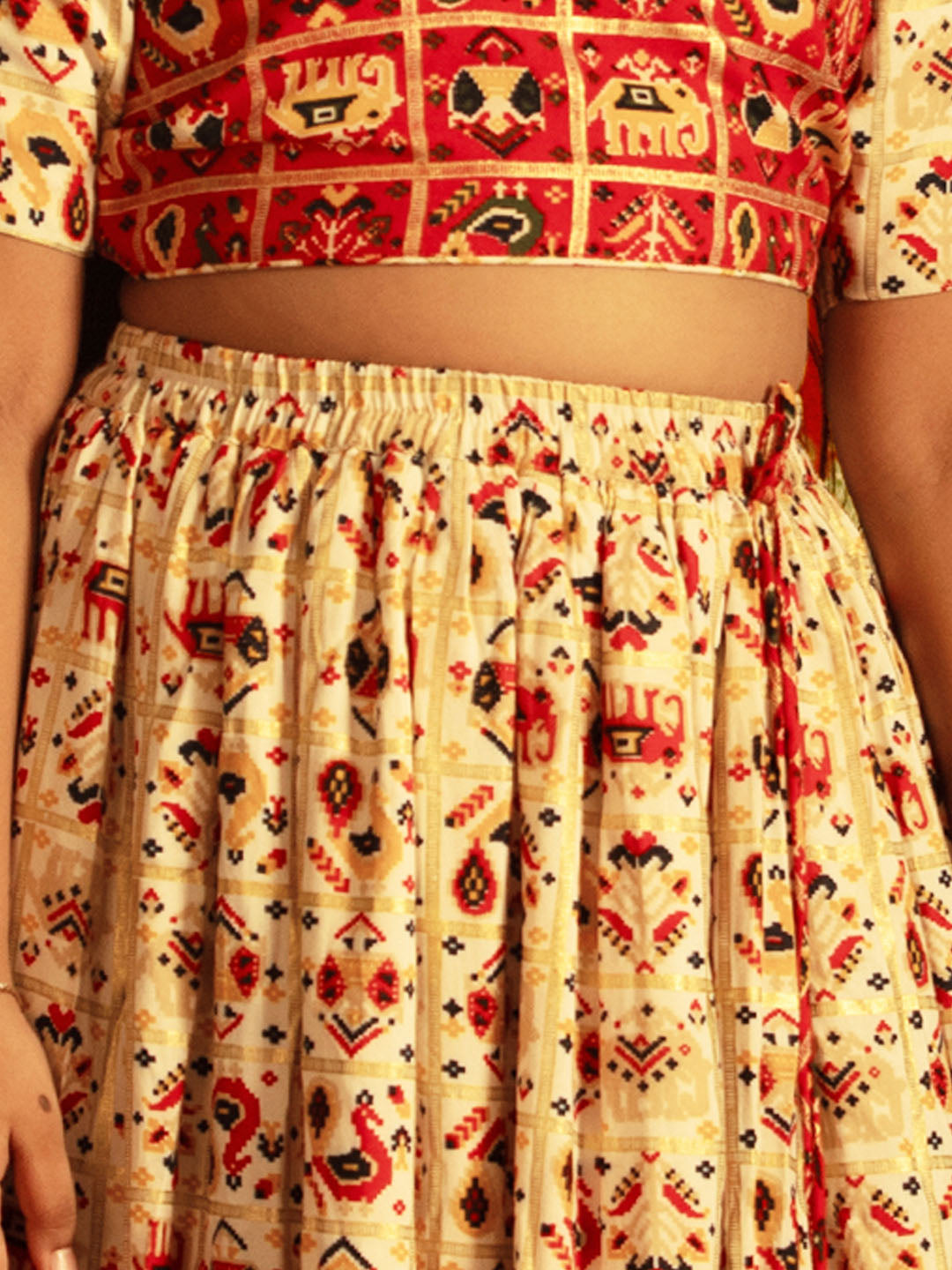 VASTRAMAY Girls' Red And Cream Patola Print Lehenga Set