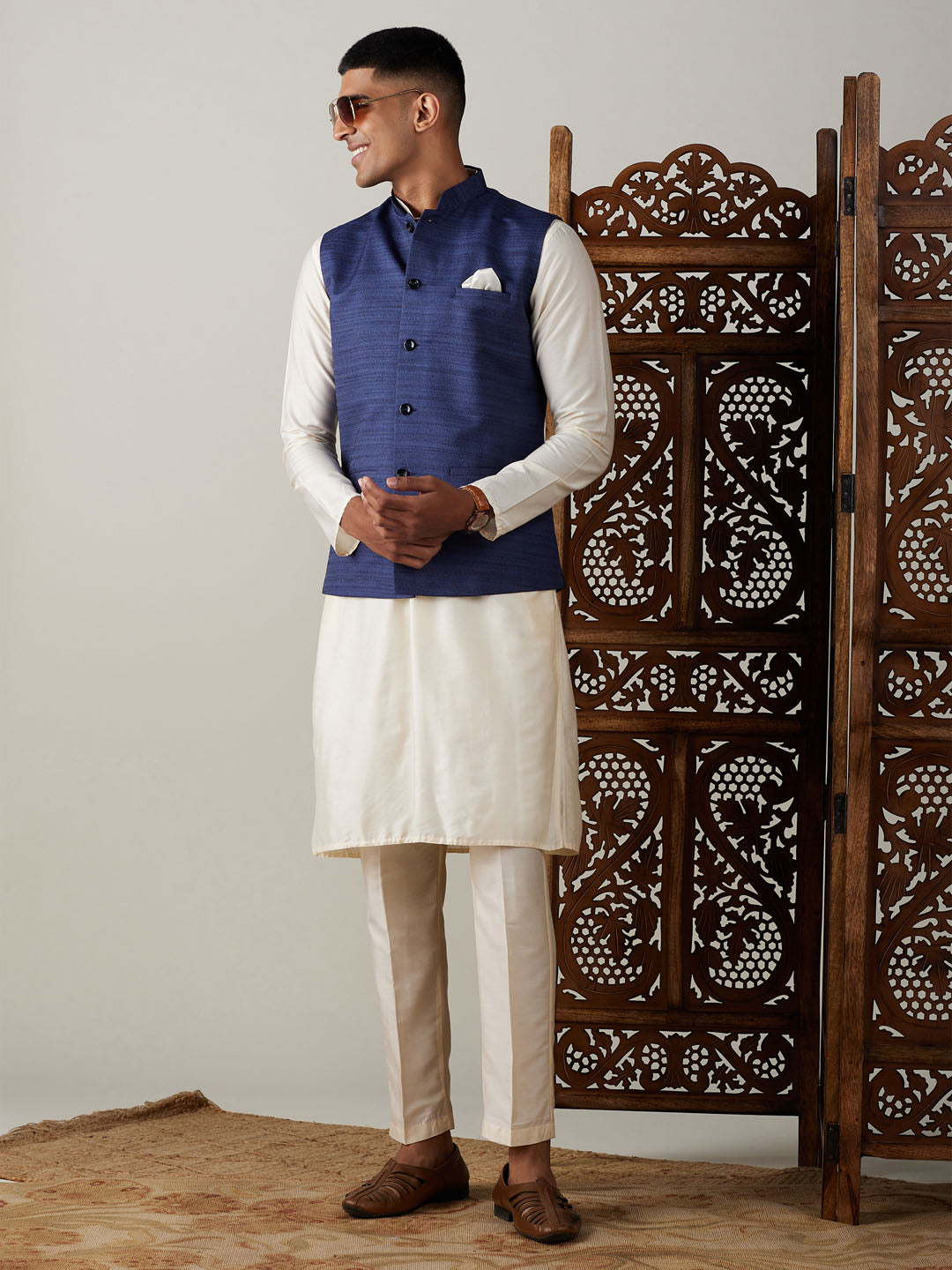 Vastramay navy blue cotton blend solid nehru jacket with cream kurta and pant set