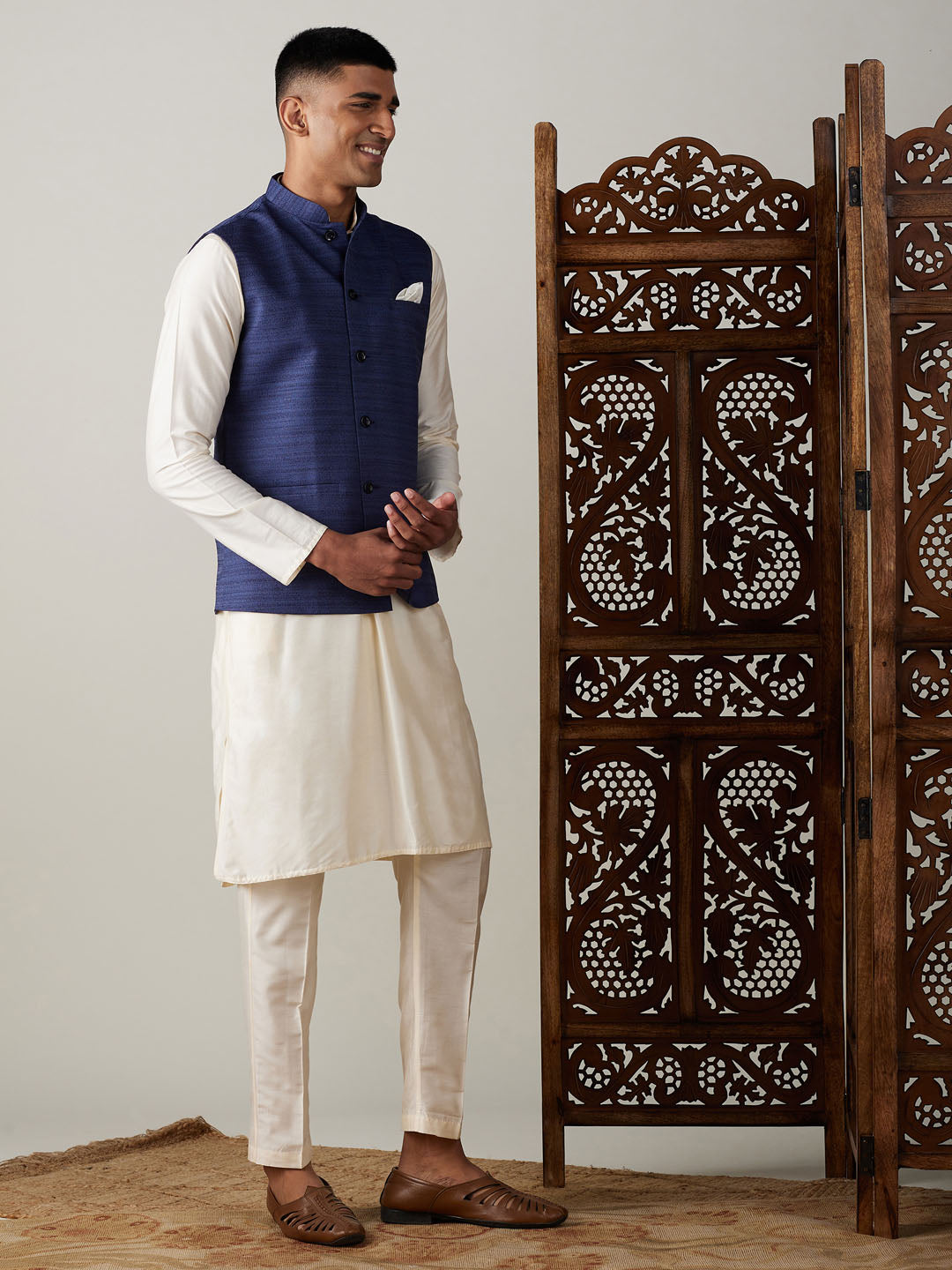 Vastramay navy blue cotton blend solid nehru jacket with cream kurta and pant set