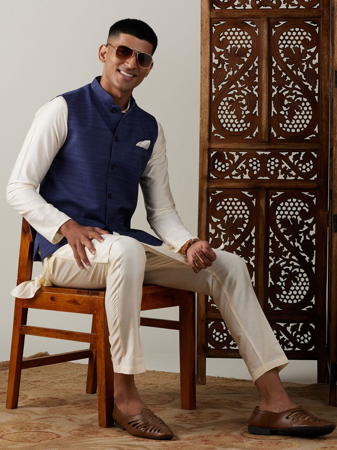 Vastramay navy blue cotton blend solid nehru jacket with cream kurta and pant set