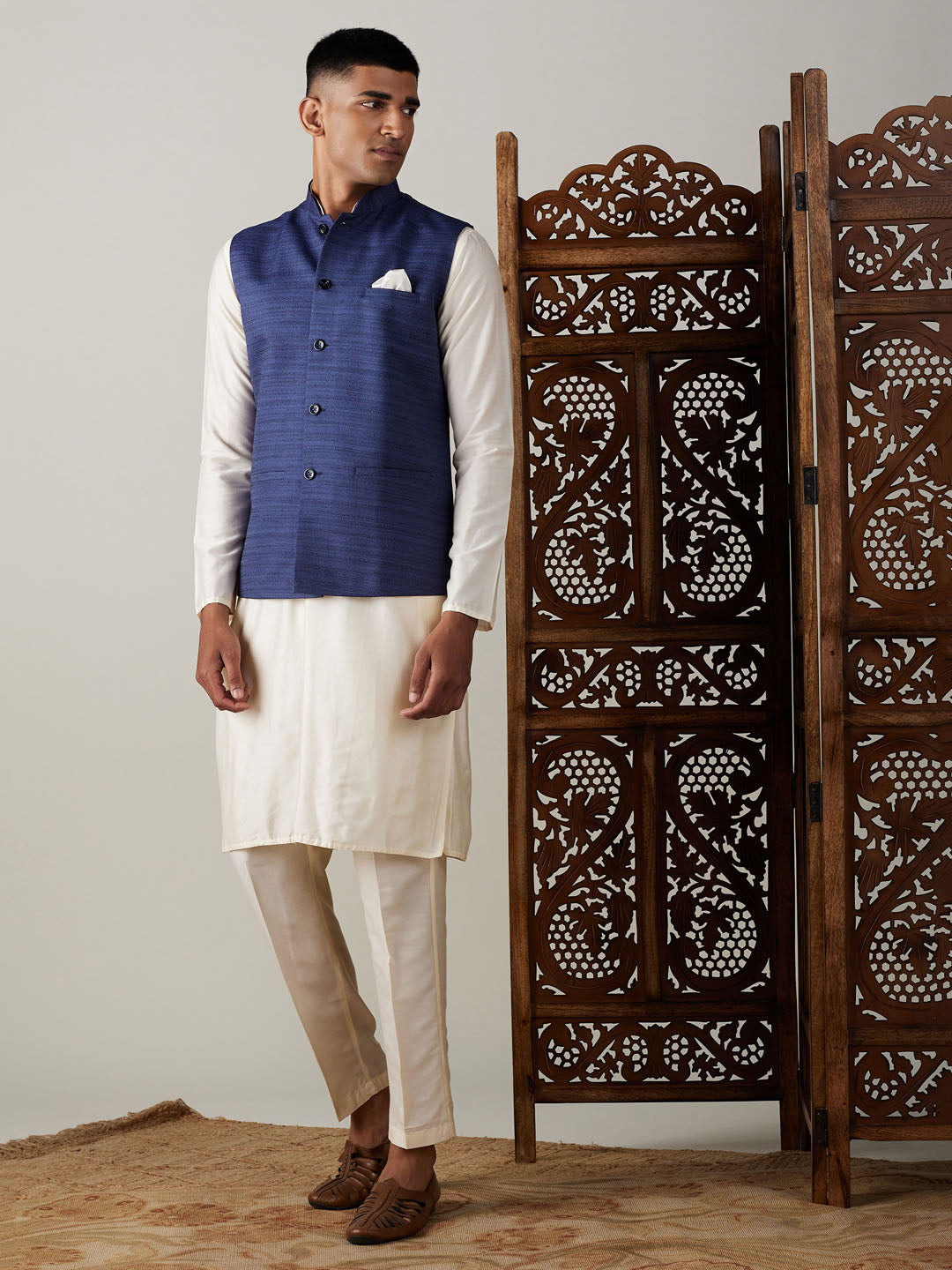 Vastramay navy blue cotton blend solid nehru jacket with cream kurta and pant set