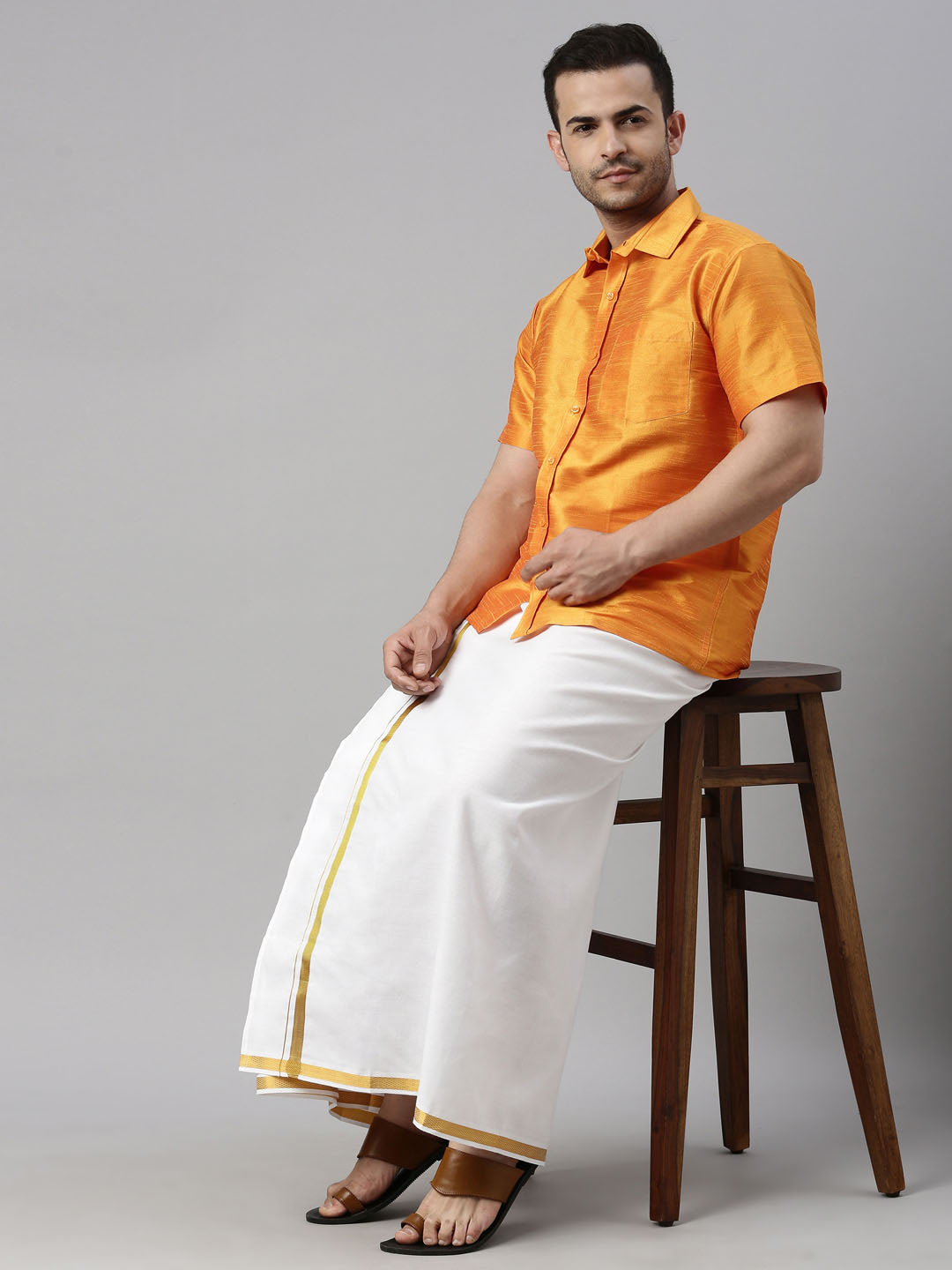 vastramay mens orange color solid ethnic shirt and mundu set