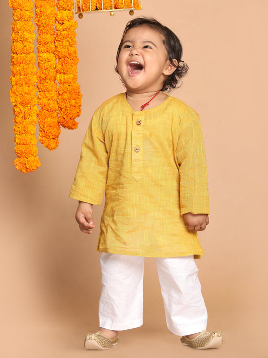 boys yellow color kurta and white pyjama set