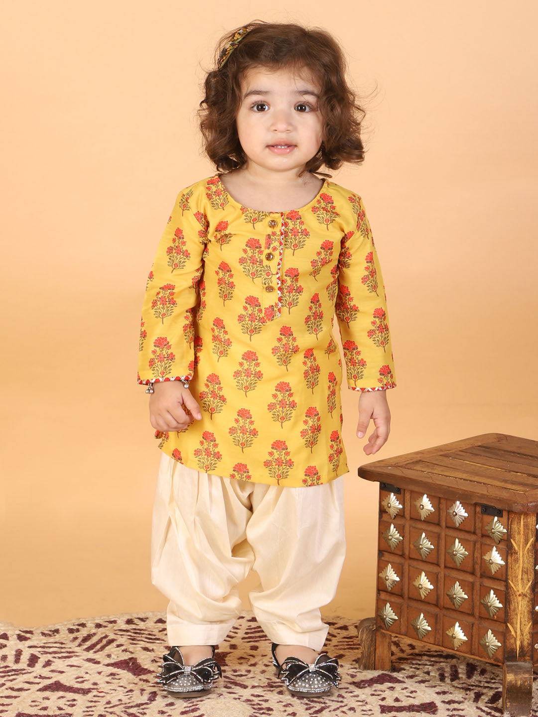 girls orange base printed cotton blend kurta patiyala set