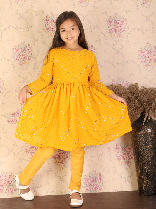 shrestha by Vastramay girls yellow color mirror work kurta and churidar set