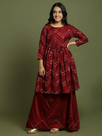 Yuva By VASTRAMAY Girl's Maroon Mirror Work Flared Kurta And Long Skirt Set