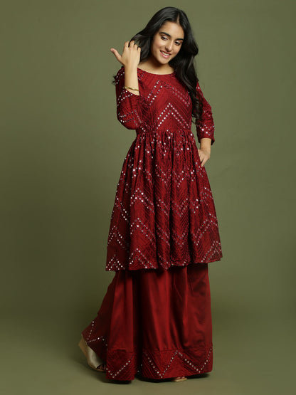 Yuva By VASTRAMAY Girl's Maroon Mirror Work Flared Kurta And Long Skirt Set