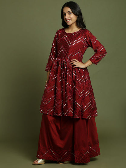 Yuva By VASTRAMAY Girl's Maroon Mirror Work Flared Kurta And Long Skirt Set