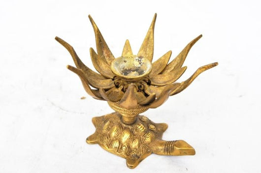 Brass Flower Candle Holder On Tortoise