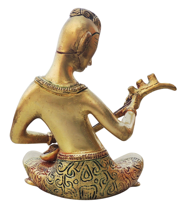 Brass Man With Muscial Instrument