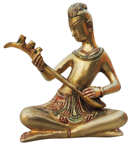 Brass Man With Muscial Instrument