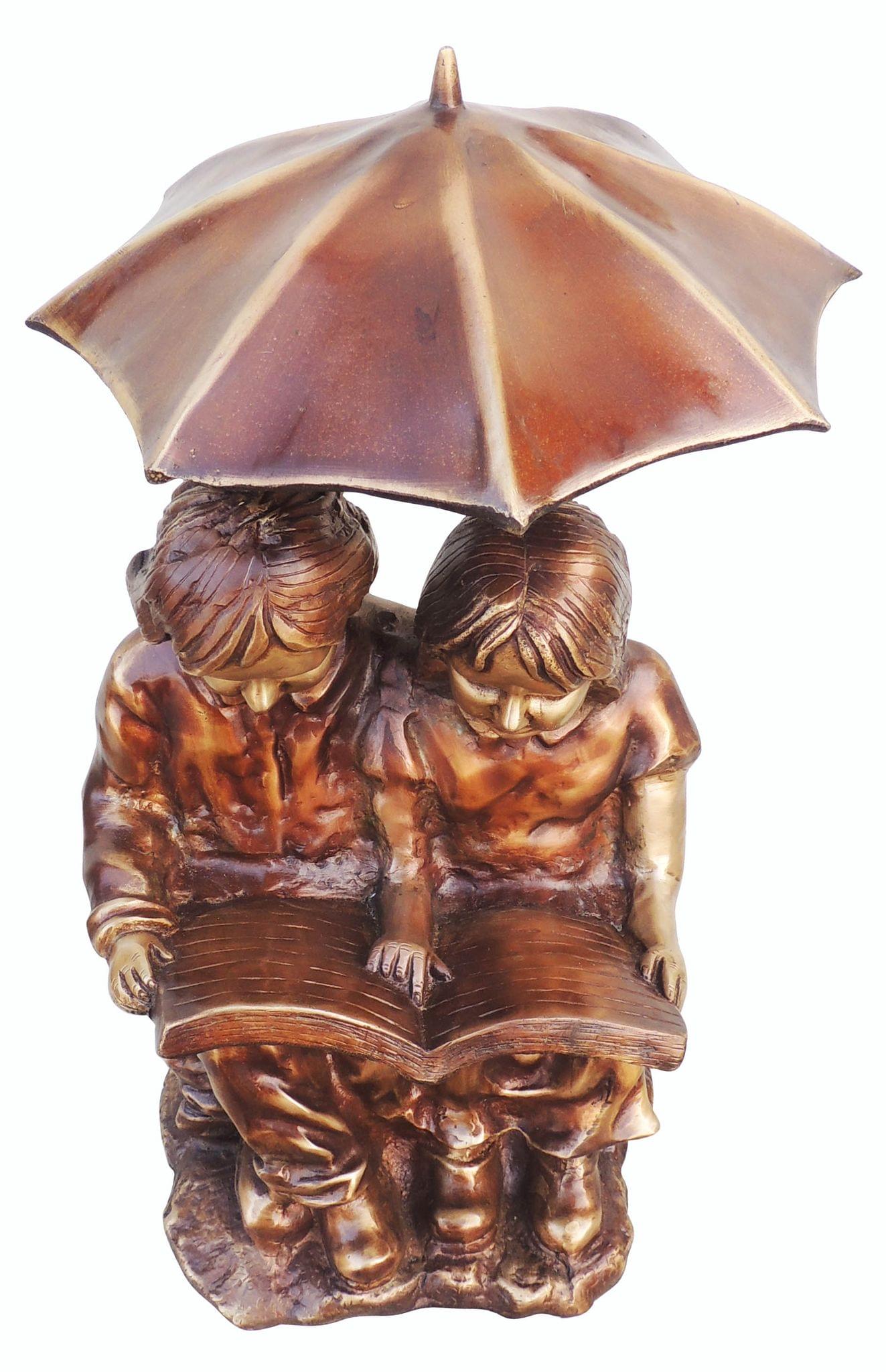 Brass Sitting Child With Umbrella Statue