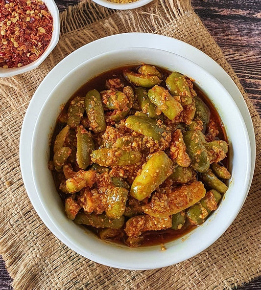 Mithos Tindoora Pickle (Donda Kaya Pickles) with garlic